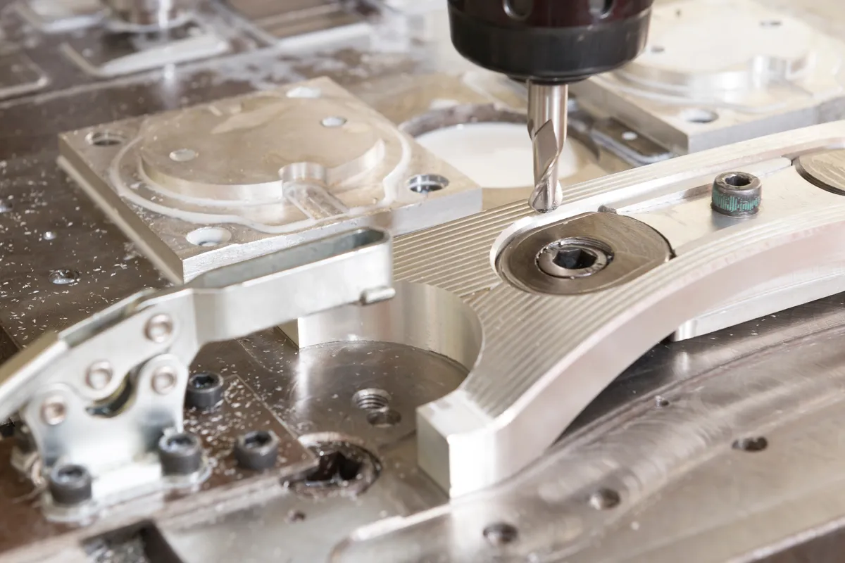 The CNC milling machine cutting the automotive part with the solid ball end mill tool . The CNC milling machine cutting the automotive part with the solid ball end mill tool .